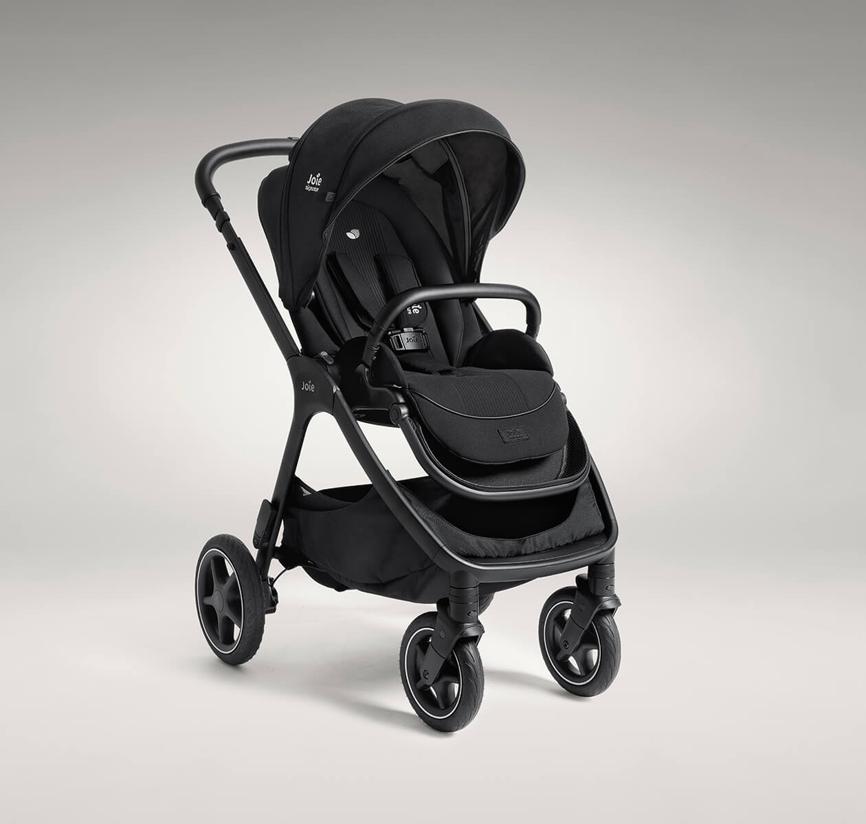 Joie finiti pram in light gray at an angle.