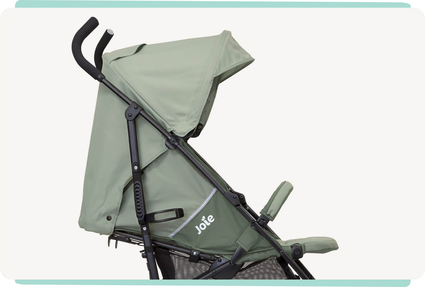  Side profile of Joie green nitro stroller.