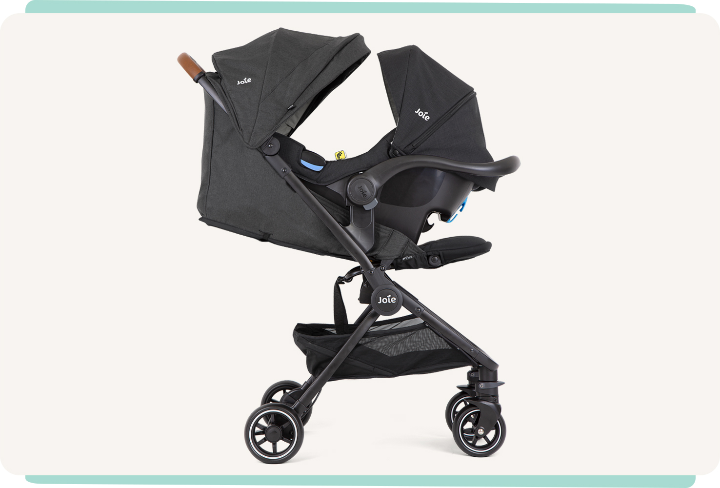  A black Joie Pact Flex stroller in profile, with an infant car seat attached.