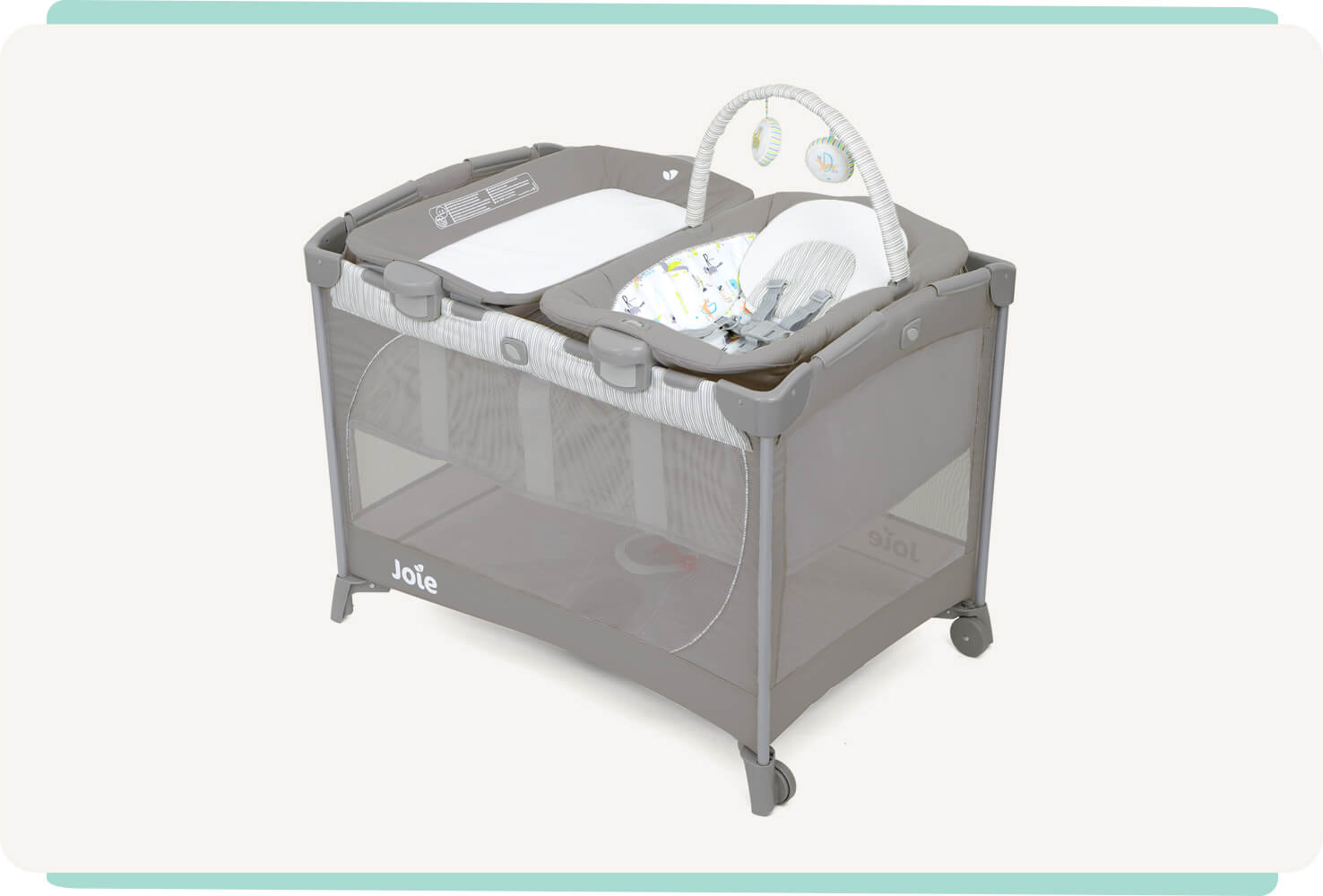 Joie travel cot commuter change & bouncer in grey with bassinet, changer, and bouncer seat at a right angle.