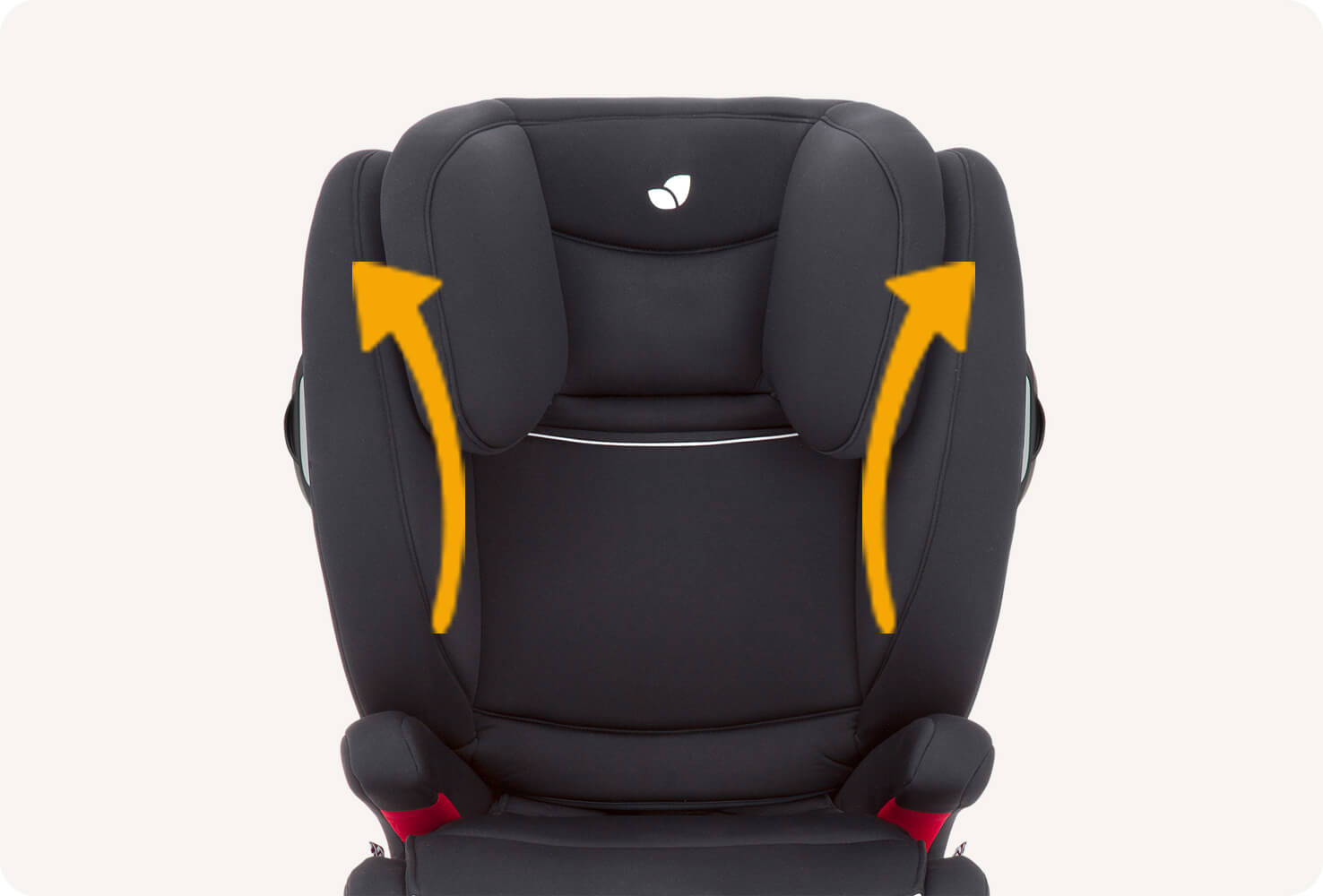 Closeup on a black Transcend booster seat with two curved orange arrows indicating the shoulders of the seat widening.