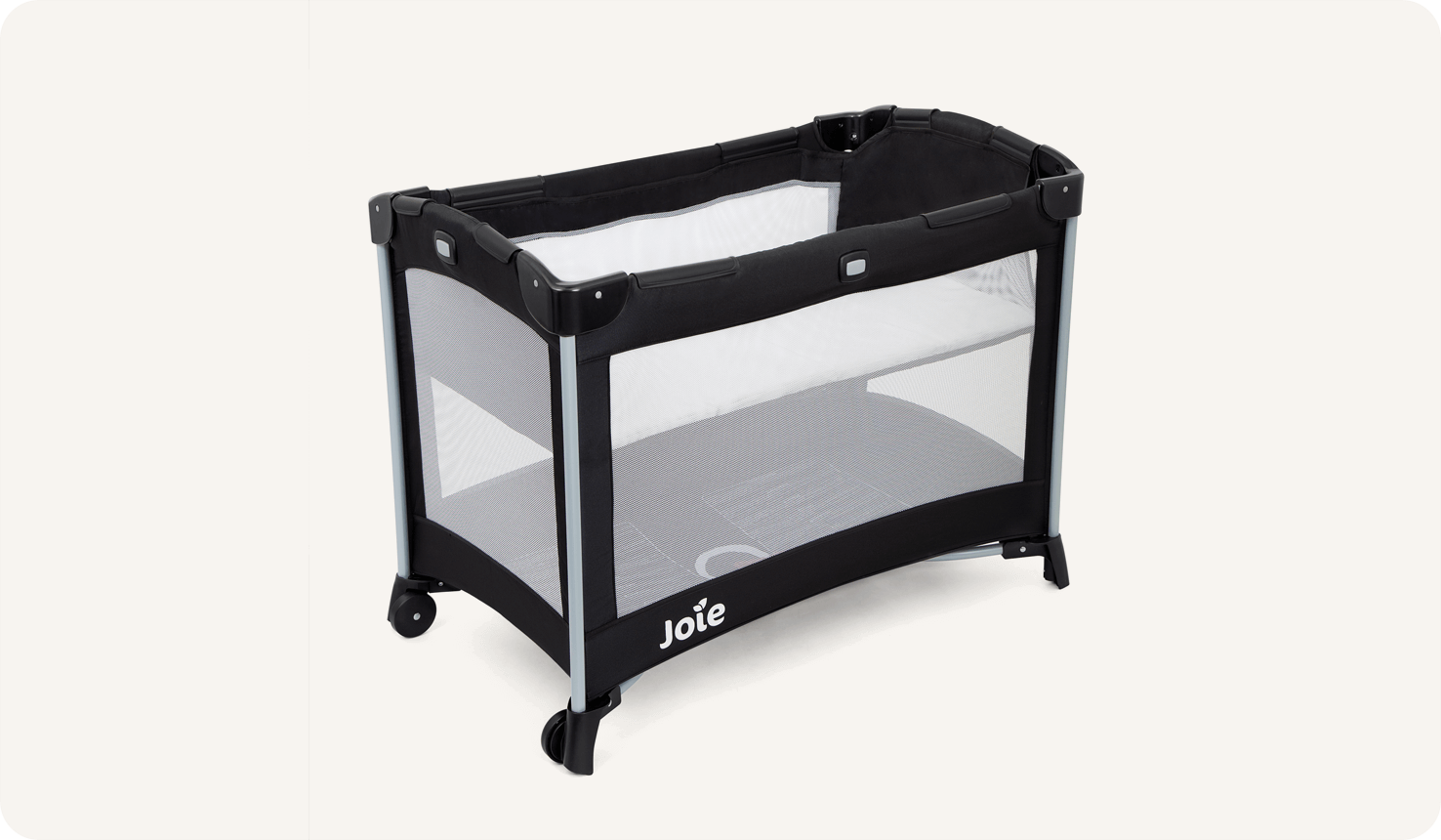 Joie Kubbie travel cot with bassinet in black, at an angle facing left.