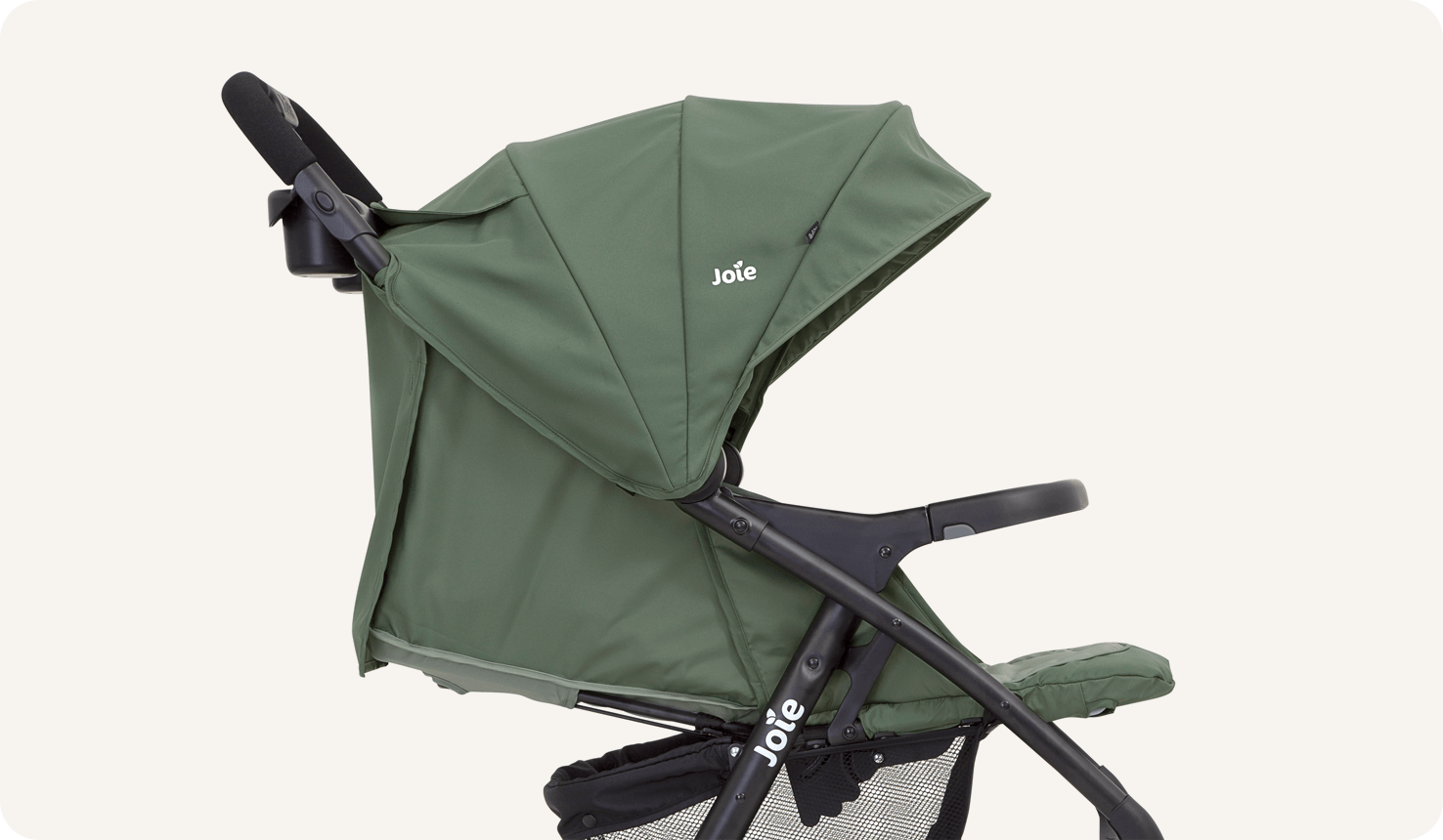   Side profile zoomed in on Joie light green muze lx stroller.