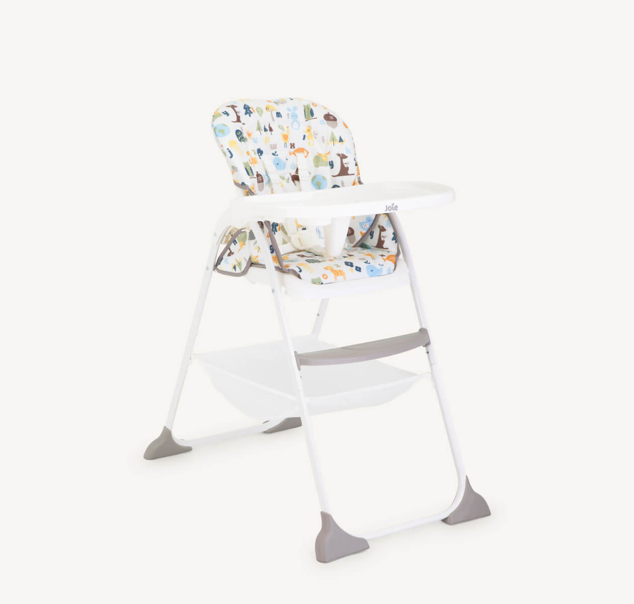 The Joie highchair mimzy Snacker in a multi-color print featuring woodland animals and plants from a right angle. 