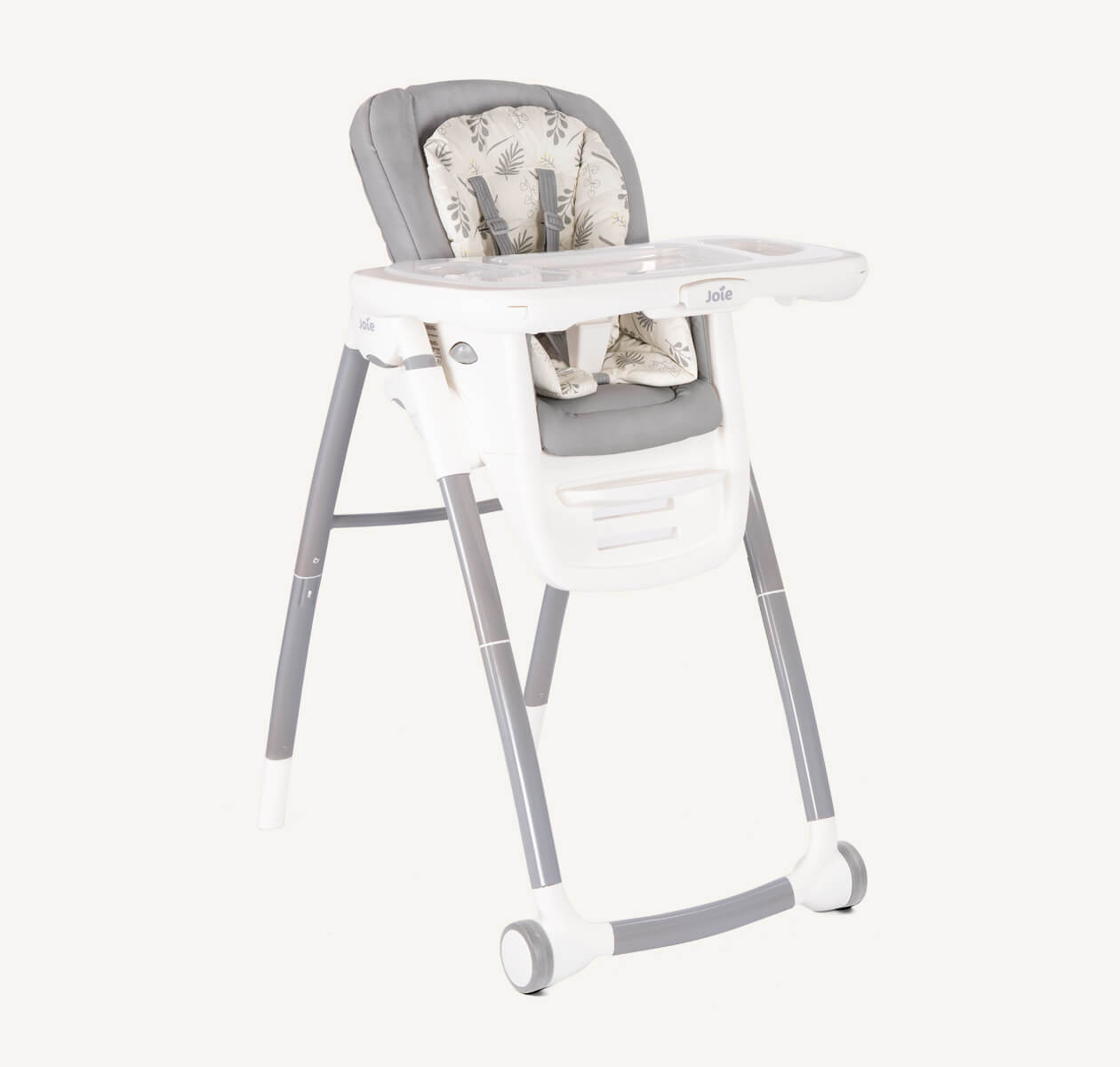 A light grey and white multiply highchair with front wheels and tray at a right angle 