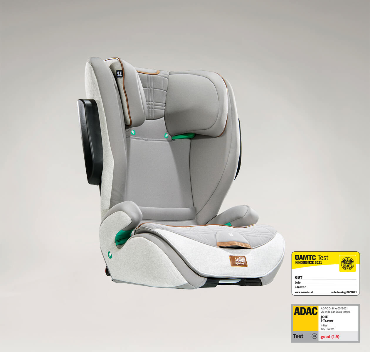 Joie i-Traver booster seat in light gray at an angle, with the ADAC test label in the lower right corner.