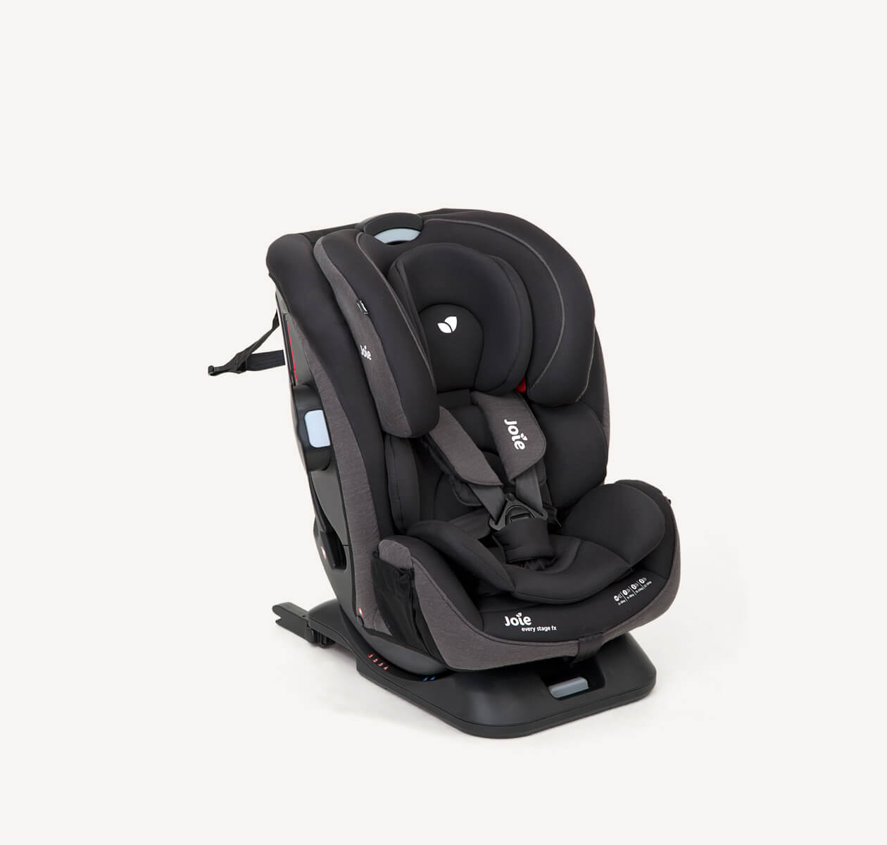  The Joie Every Stage FX car seat in a black and gray colour with 5-point harness and infant insert, at an angle.