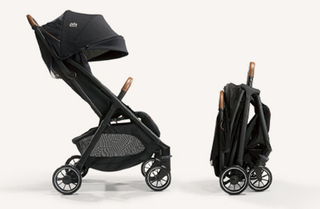 Joie parcel stroller in light gray shown from a side view fully open and as a freestanding, compact fold.