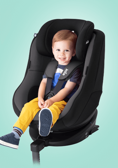 Toddler in the Joie Spin 360 spinning car seat