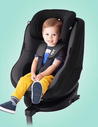 Toddler in the Joie Spin 360 spinning car seat