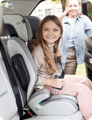 Child in Joie's iTraver high back booster car seat