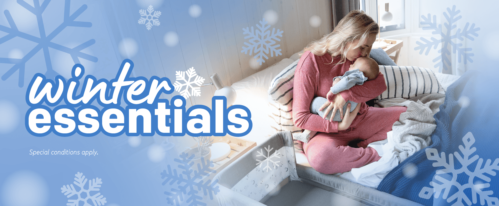 image of a mother holding baby snuggled in bed with text referencing winter essentials 